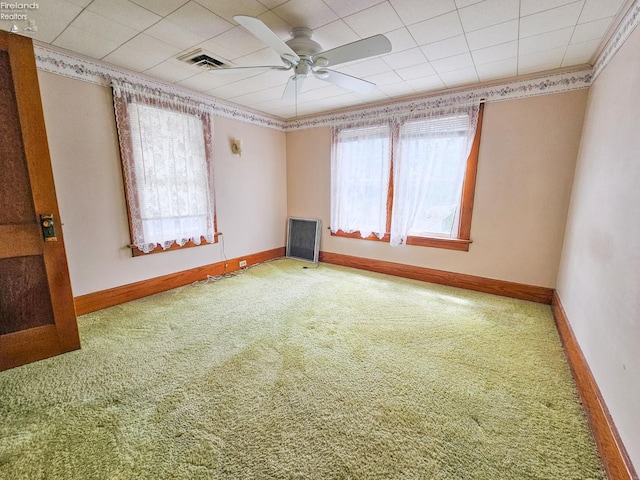 124 Walter St, Bellevue, OH 44811 - spare room with carpet floors, ceiling fan, and baseboards