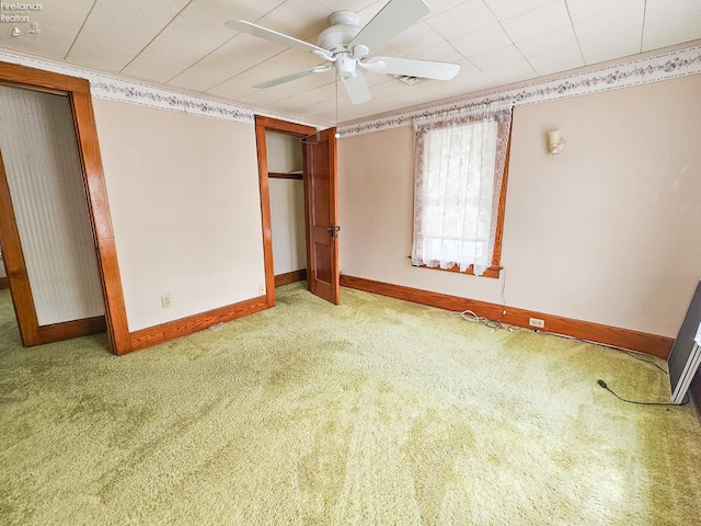 124 Walter St, Bellevue, OH 44811 - unfurnished bedroom with light colored carpet, baseboards, a closet, and ceiling fan