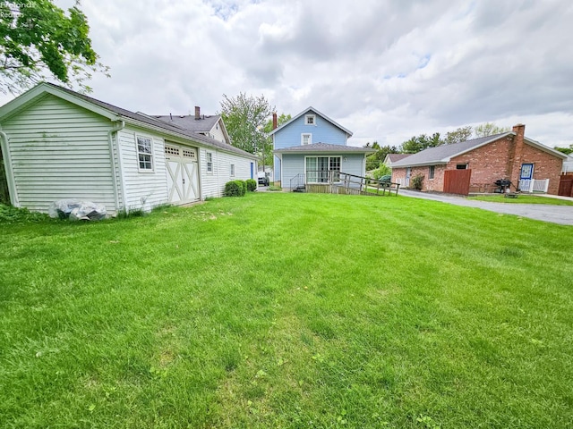 124 Walter St, Bellevue, OH 44811 - back of house with a yard