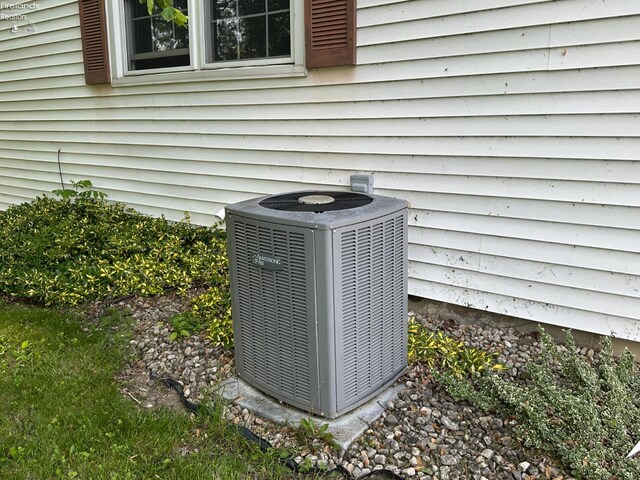 203 Washington St, Bettsville, OH 44815 - exterior view of central air condition unit