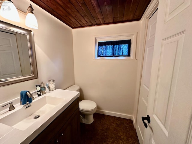 203 Washington St, Bettsville, OH 44815 - half bathroom featuring wood ceiling, toilet, vanity, and baseboards