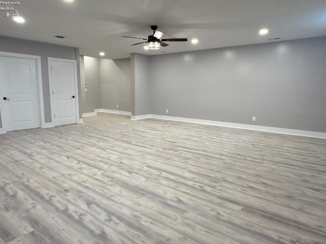10556 E Bayshore Rd Unit 4C, Marblehead, OH 43440 - finished below grade area with light wood-type flooring, baseboards, ceiling fan, and recessed lighting