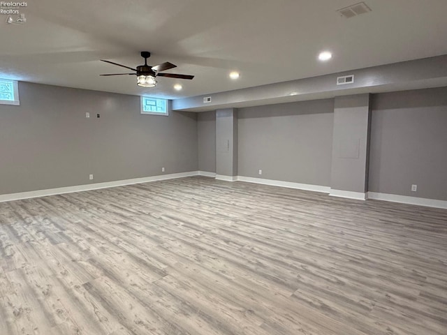 10556 E Bayshore Rd Unit 4C, Marblehead, OH 43440 - basement featuring wood finished floors, recessed lighting, and baseboards