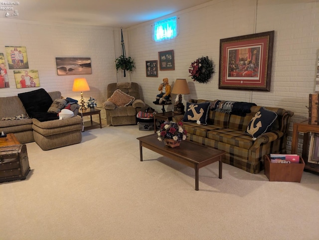 508 Snowy Egret Dr, Huron, OH 44839 - living room featuring carpet flooring and brick wall