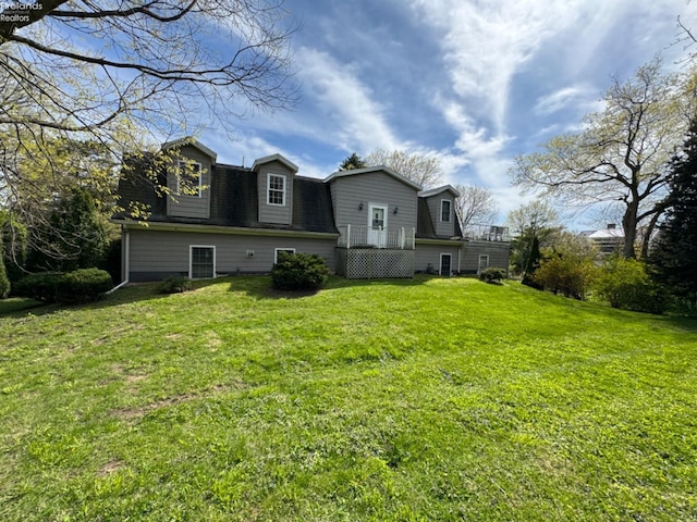 3540 N Surfside Dr, Port Clinton, OH 43452 - back of house featuring a yard