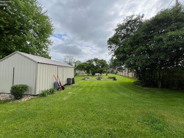 90 Newton St, Norwalk, OH 44857 - view of grassy yard with an outdoor structure