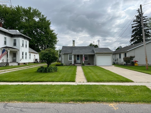 90 Newton St, Norwalk, OH 44857 - single story home with concrete driveway, a garage, a chimney, and a front yard