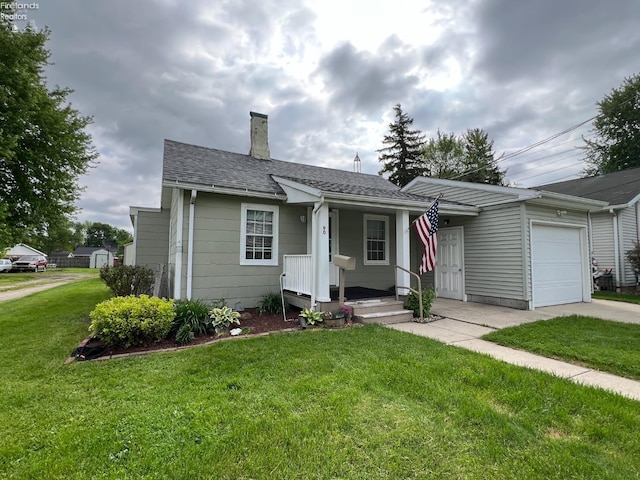 90 Newton St, Norwalk, OH 44857 - bungalow-style house featuring an attached garage, a chimney, a front lawn, driveway, and a shingled roof