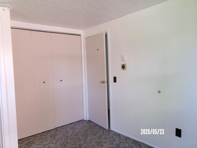 126 E Ottawa St, Oak Harbor, OH 43449 - unfurnished bedroom with carpet floors and a closet