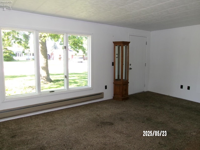 126 E Ottawa St, Oak Harbor, OH 43449 - carpeted spare room featuring a baseboard radiator