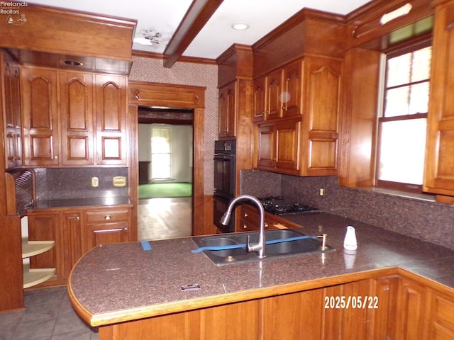 408 W Main St, Bellevue, OH 44811 - kitchen with ornamental molding, brown cabinets, backsplash, tile patterned flooring, and a sink