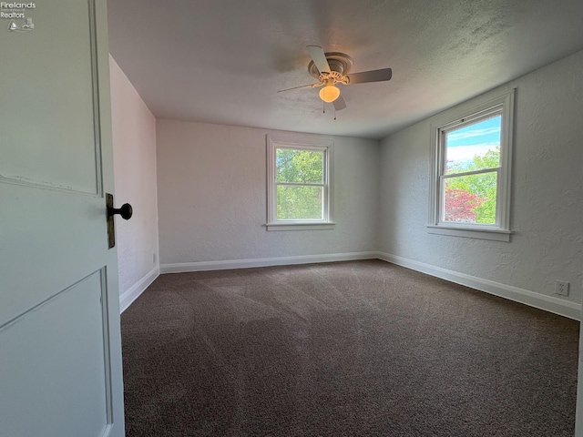 427 N Clover St, Fremont, OH 43420 - spare room with ceiling fan, carpet, baseboards, and a textured wall