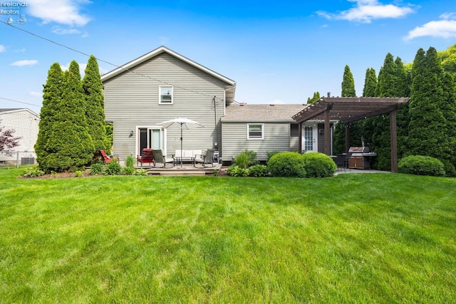 310 Linden Way, Sandusky, OH 44870 - back of property featuring a pergola, a patio, and a lawn