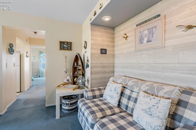 326 Clinton Reef Dr Unit 326, Port Clinton, OH 43452 - sitting room with carpet, wooden walls, and baseboards