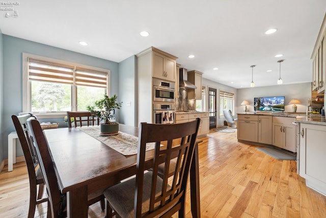 3999 NE Catawba Rd Unit 29, Port Clinton, OH 43452 - dining space with light wood-style flooring and recessed lighting
