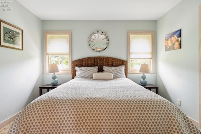 3999 NE Catawba Rd Unit 29, Port Clinton, OH 43452 - carpeted bedroom featuring multiple windows