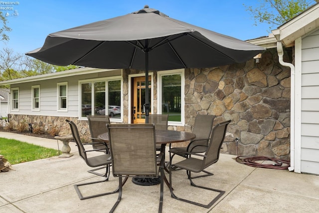 3999 NE Catawba Rd Unit 29, Port Clinton, OH 43452 - view of patio / terrace with outdoor dining space