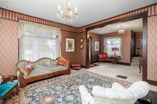 133 E Forest St, Clyde, OH 43410 - carpeted living area featuring a chandelier and wallpapered walls
