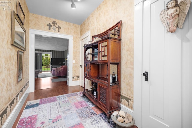 133 E Forest St, Clyde, OH 43410 - entrance foyer featuring wallpapered walls and dark wood-style flooring