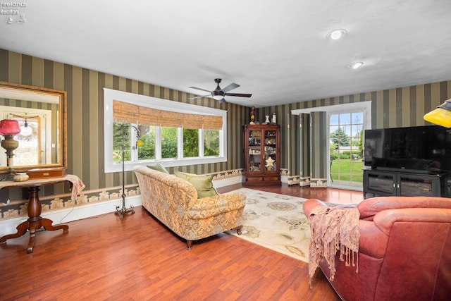 133 E Forest St, Clyde, OH 43410 - living area featuring wallpapered walls, a ceiling fan, wood finished floors, and recessed lighting