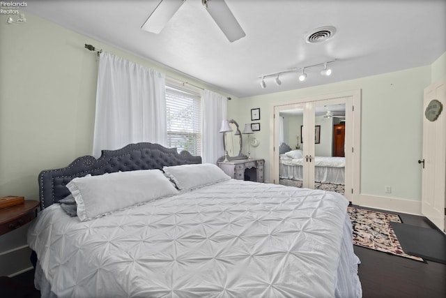 133 E Forest St, Clyde, OH 43410 - bedroom with wood finished floors, a ceiling fan, and french doors