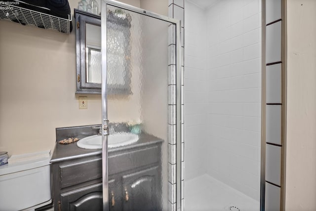 133 E Forest St, Clyde, OH 43410 - bathroom featuring a shower stall, toilet, and vanity
