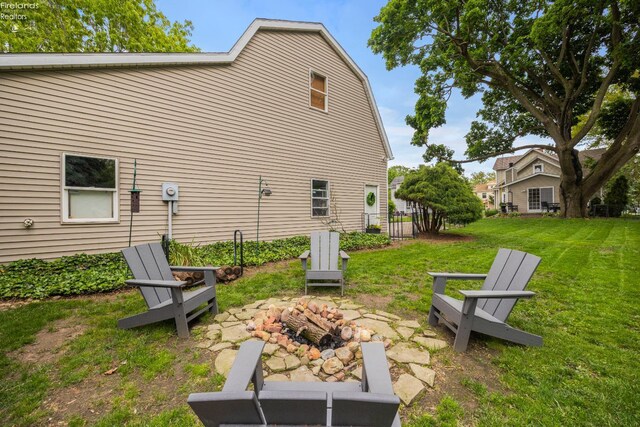 133 E Forest St, Clyde, OH 43410 - view of grassy yard with a fire pit
