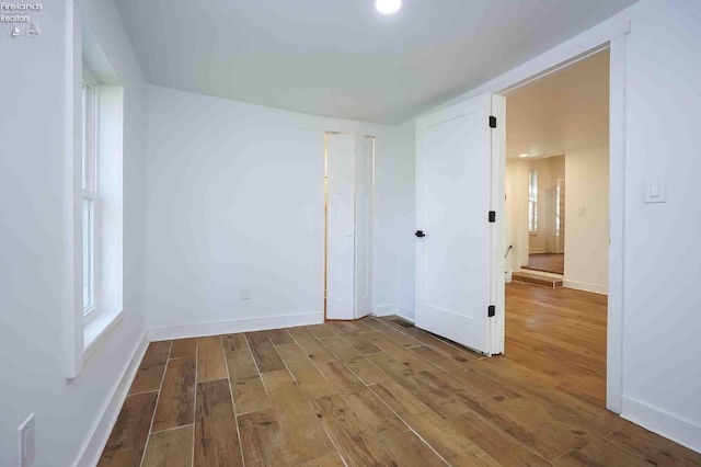 612 2nd St, Fremont, OH 43420 - empty room with wood finished floors and baseboards