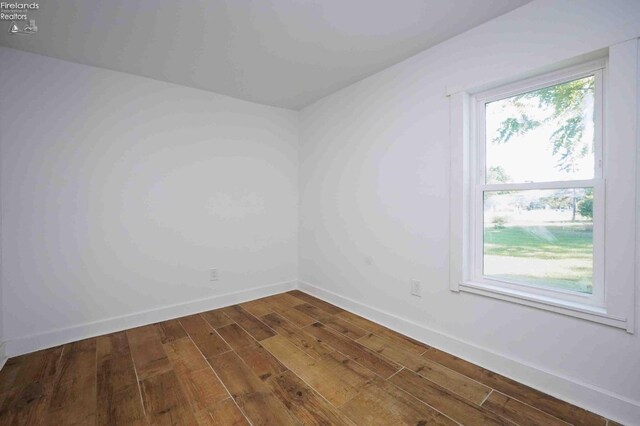 612 2nd St, Fremont, OH 43420 - unfurnished room featuring dark wood finished floors and baseboards