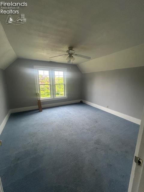 201 Heter St, Bellevue, OH 44811 - bonus room with lofted ceiling, a ceiling fan, baseboards, and carpet