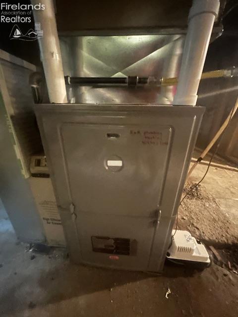 201 Heter St, Bellevue, OH 44811 - utility room with heating unit