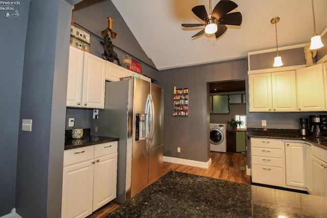 134 Hobson St, Bellevue, OH 44811 - kitchen with washer / clothes dryer, vaulted ceiling, stainless steel fridge with ice dispenser, a ceiling fan, and dark wood-style floors