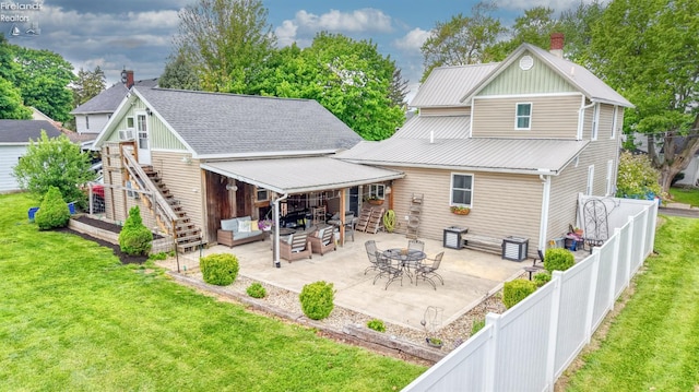 134 Hobson St, Bellevue, OH 44811 - rear view of property with a patio area, stairs, and an outdoor living space