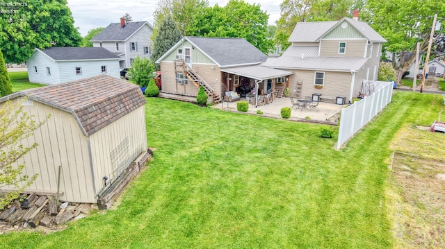 134 Hobson St, Bellevue, OH 44811 - back of house with a patio area and a residential view