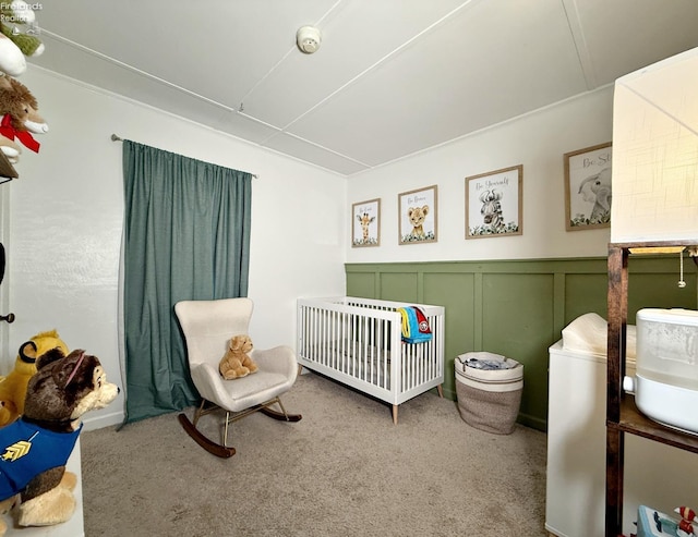 31 Mohawk St, Tiffin, OH 44883 - bedroom with a nursery area, carpet, a decorative wall, and wainscoting