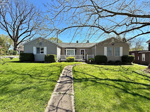 31 Mohawk St, Tiffin, OH 44883 - ranch-style home with a front lawn and a deck