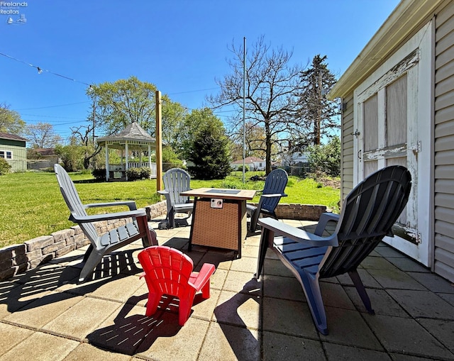 31 Mohawk St, Tiffin, OH 44883 - view of patio with an outdoor fire pit and a gazebo