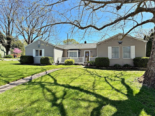 31 Mohawk St, Tiffin, OH 44883 - ranch-style house with a front yard and a wooden deck