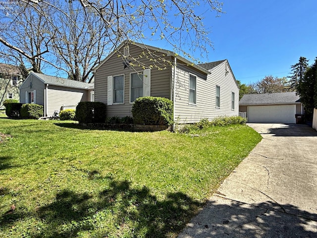 31 Mohawk St, Tiffin, OH 44883 - view of side of home featuring an outbuilding, a yard, and a garage