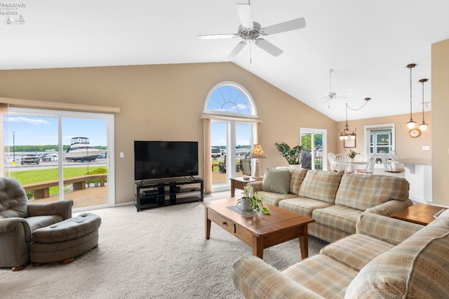 6485 E Harbor Rd Unit 38, Marblehead, OH 43440 - carpeted living room with a ceiling fan and high vaulted ceiling