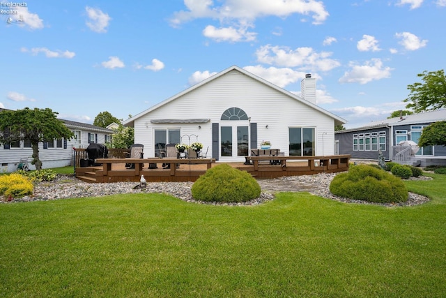 6485 E Harbor Rd Unit 38, Marblehead, OH 43440 - back of property featuring a deck, french doors, a chimney, and a yard