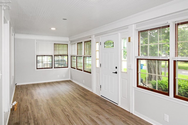713 Madison St, Port Clinton, OH 43452 - entrance foyer with ornamental molding, wood finished floors, baseboards, and recessed lighting