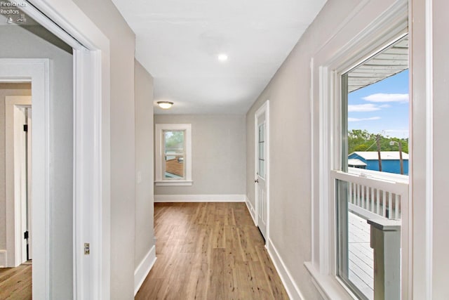 713 Madison St, Port Clinton, OH 43452 - hall with light wood-style floors and baseboards
