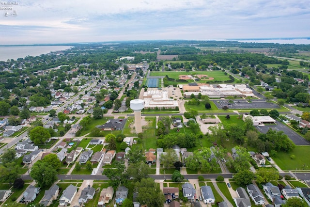 713 Madison St, Port Clinton, OH 43452 - aerial view of property and surrounding area with nearby suburban area and a large body of water