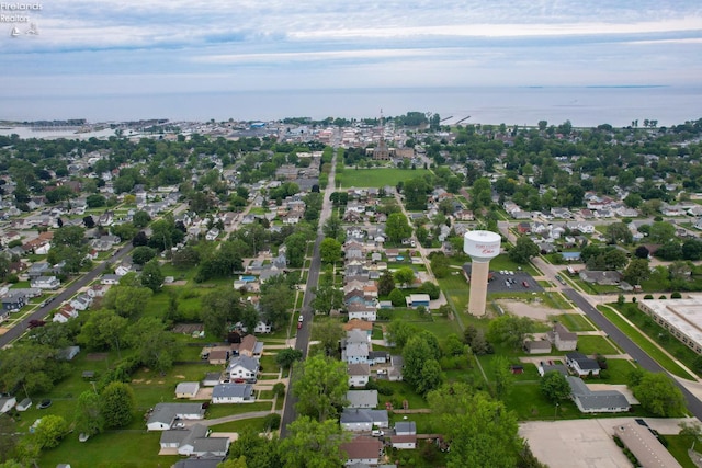 713 Madison St, Port Clinton, OH 43452 - aerial view of property and surrounding area featuring a nearby body of water and nearby suburban area