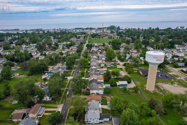 713 Madison St, Port Clinton, OH 43452 - aerial view of property and surrounding area featuring nearby suburban area and a large body of water