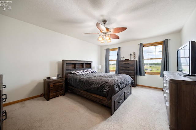 4936 Gibbs Rd, Norwalk, OH 44857 - bedroom with light colored carpet, baseboards, and ceiling fan