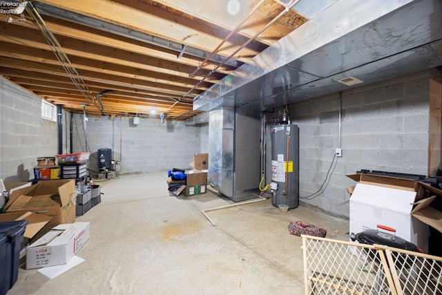 4936 Gibbs Rd, Norwalk, OH 44857 - unfinished basement with water heater and a water pressure tank