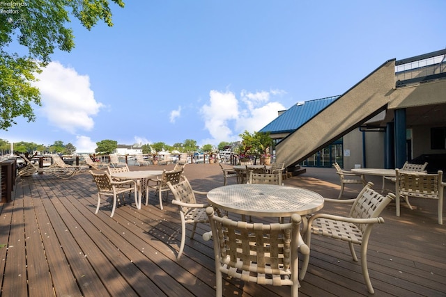 4370 Marin Woods Dr Unit D, Port Clinton, OH 43452 - wooden terrace featuring outdoor dining area