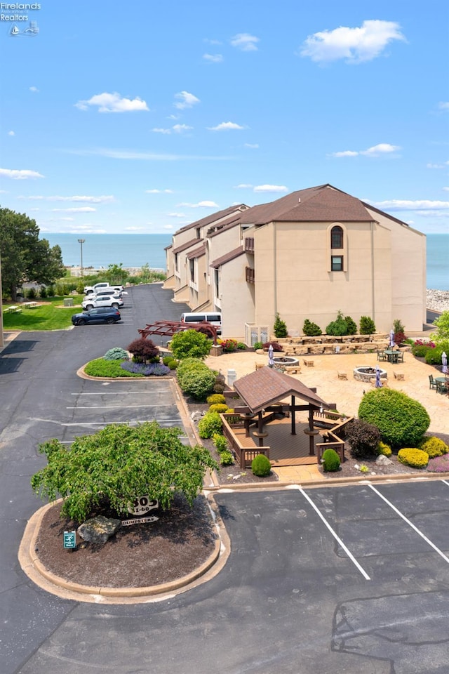 1807 E Perry St Unit 69, Port Clinton, OH 43452 - view of property with uncovered parking and a water view